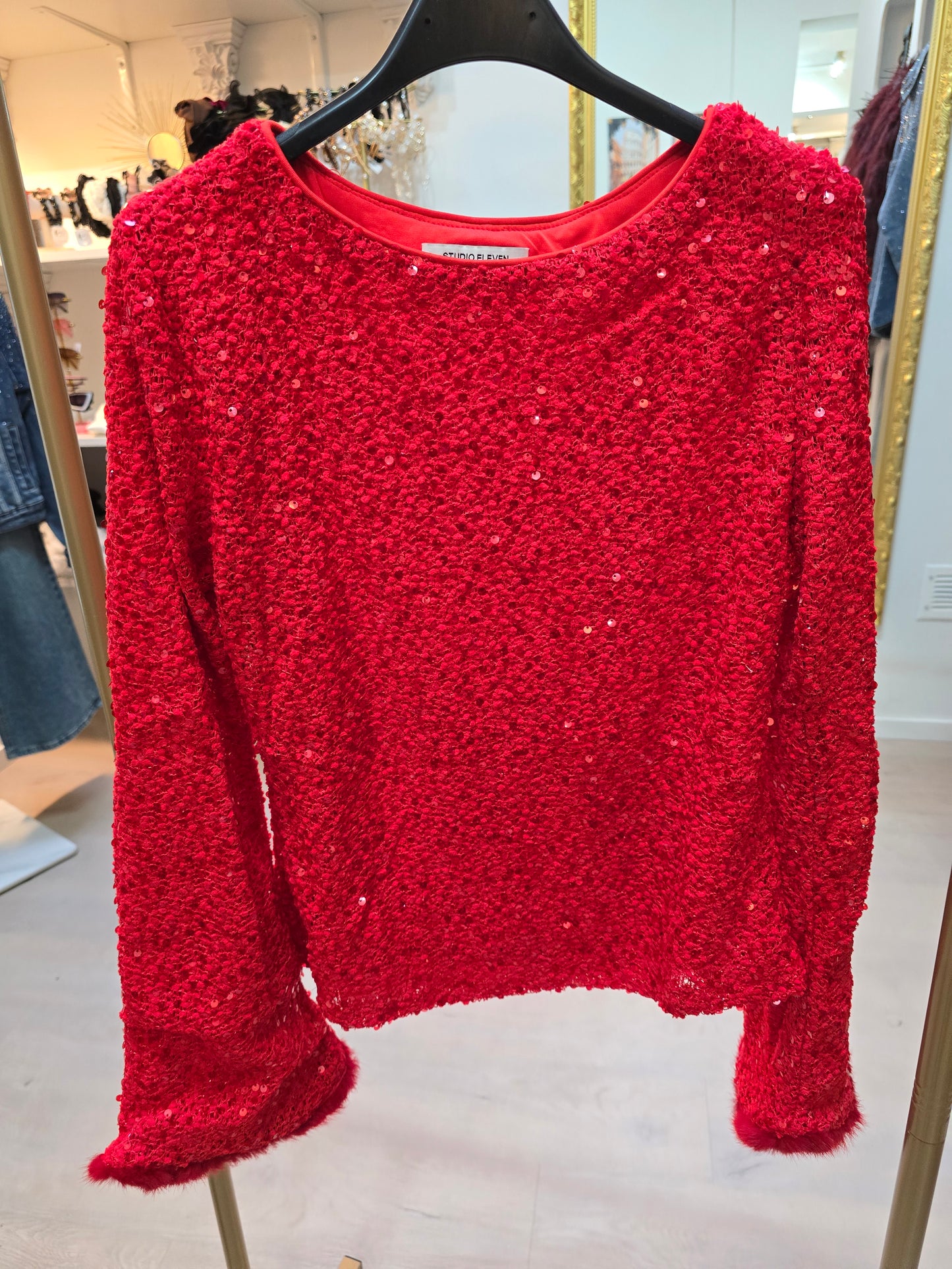 Pailetten Oberteil mit Fellärmel