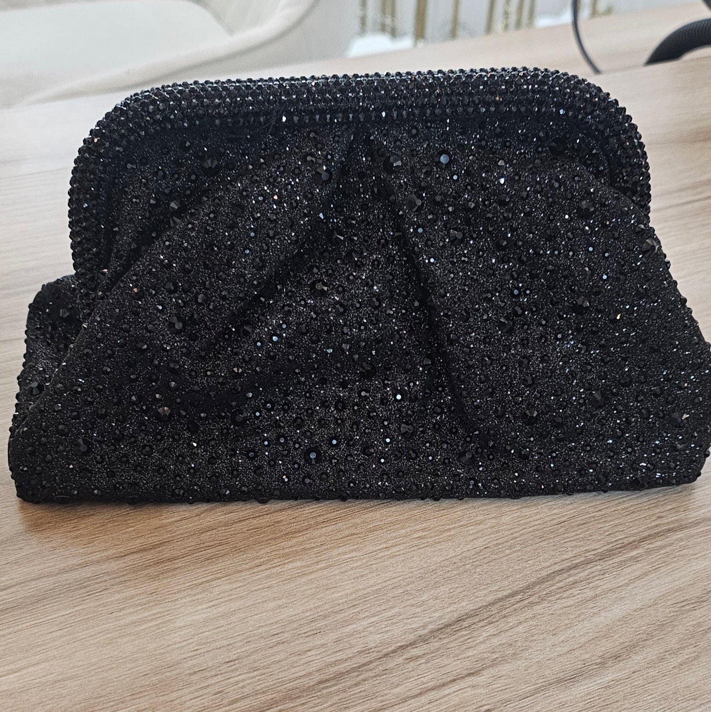 kleine schwarze Glitzertasche